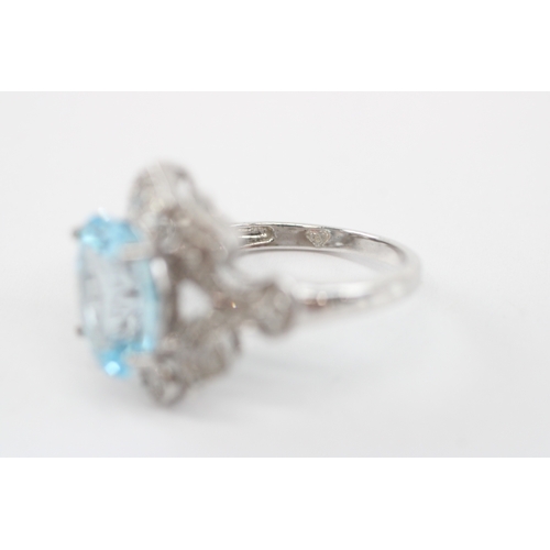 54 - 9ct white gold blue topaz diamond cocktail ring (5.1g) Size N