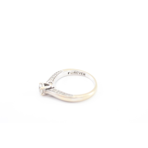 56 - 18ct gold 'FOREVER' diamond ring (3.2g) Size J