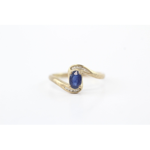 59 - 9ct gold diamond sapphire bypass ring (1.8g) Size O