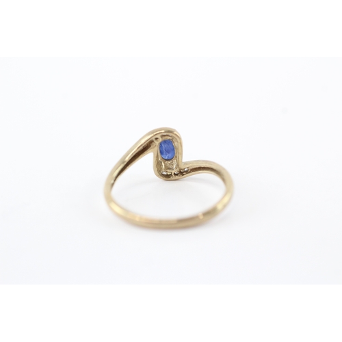 59 - 9ct gold diamond sapphire bypass ring (1.8g) Size O