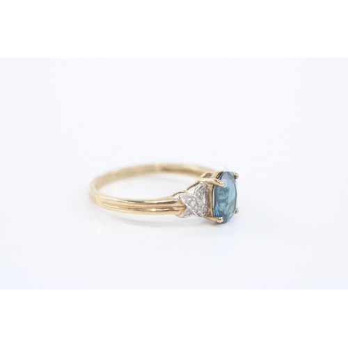 9 - 9ct gold blue topaz diamond ring (2g) Size P