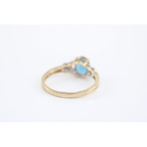 9 - 9ct gold blue topaz diamond ring (2g) Size P