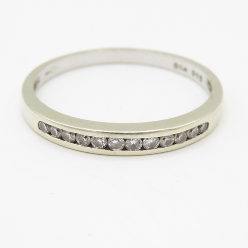 46 - 9ct white gold diamond channel set ring (1.5g) Size O