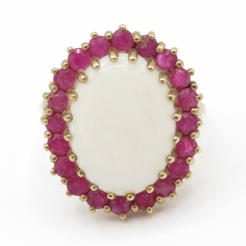 59 - 9ct gold opal and ruby halo statement ring (4.95g) Size P