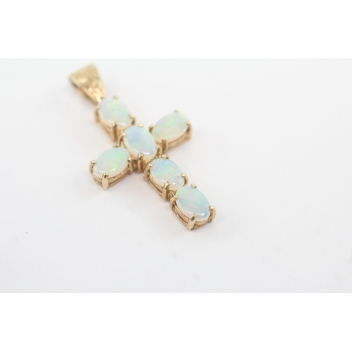 12 - 9ct gold opal cross pendant (2.1g)