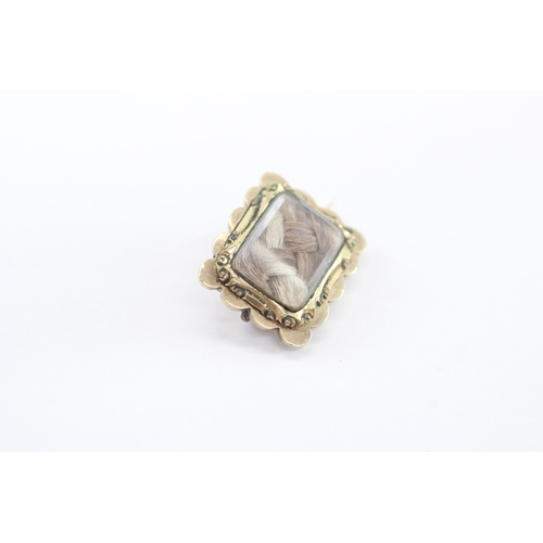 15 - 9ct gold mourning hairwork brooch (2.4g)