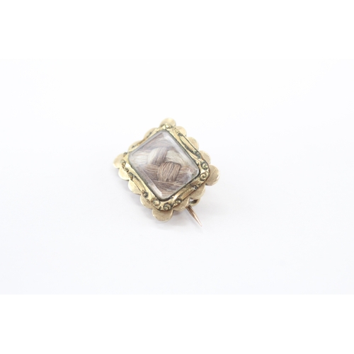 15 - 9ct gold mourning hairwork brooch (2.4g)