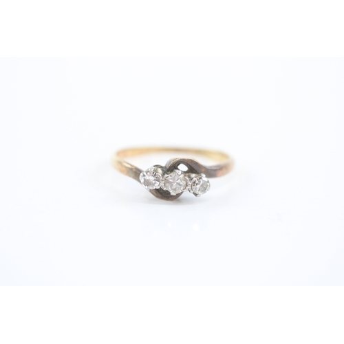17 - 18ct gold diamond three stone ring (2.1g) Size M 1/2