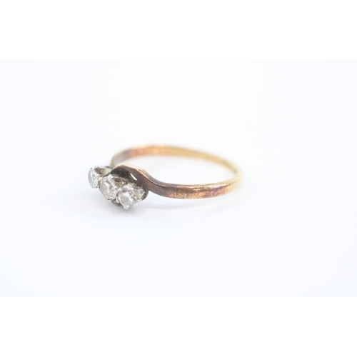 17 - 18ct gold diamond three stone ring (2.1g) Size M 1/2