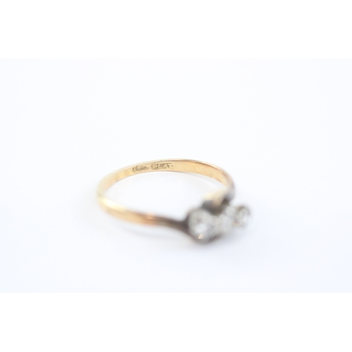 17 - 18ct gold diamond three stone ring (2.1g) Size M 1/2