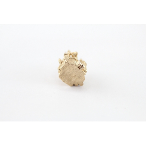 23 - 9ct gold mouse in castle charm (2.5g)