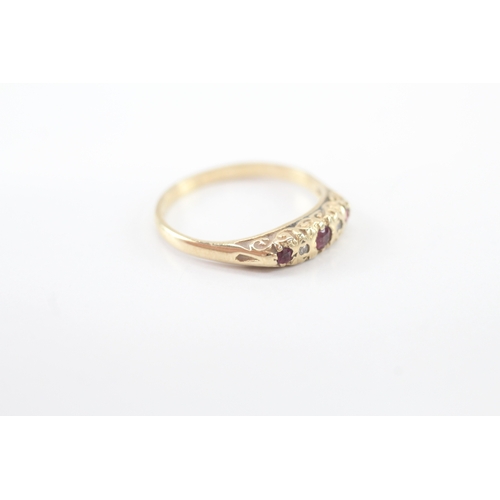 31 - 9ct gold vintage ruby diamond ring with scroll details on the side (1.9g) Size O