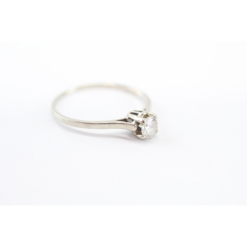 33 - 14ct white gold diamond solitaire ring (1.3g) Size P 1/2