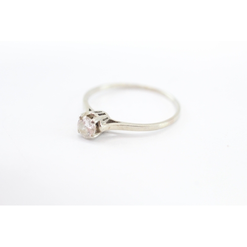 33 - 14ct white gold diamond solitaire ring (1.3g) Size P 1/2