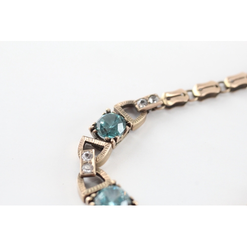 4 - 9ct gold blue zircon white paste bracelet (9g)