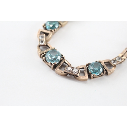 4 - 9ct gold blue zircon white paste bracelet (9g)