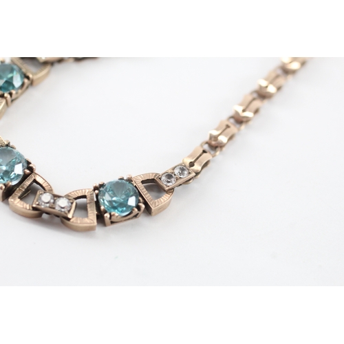 4 - 9ct gold blue zircon white paste bracelet (9g)