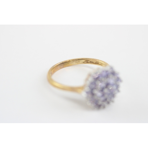 41 - 9ct gold tanzanite cluster ring (2.5g) Size P