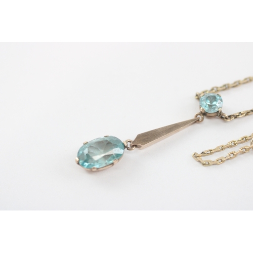 42 - 9ct gold blue zircon necklace (5.1g)