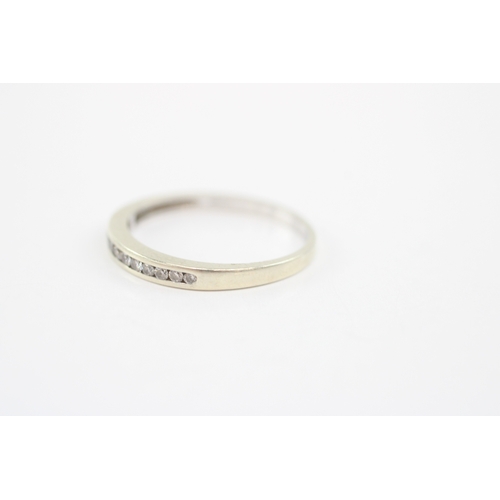 46 - 9ct white gold diamond channel set ring (1.5g) Size O