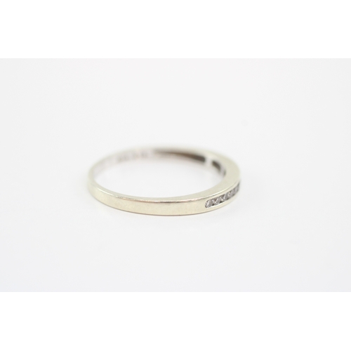 46 - 9ct white gold diamond channel set ring (1.5g) Size O