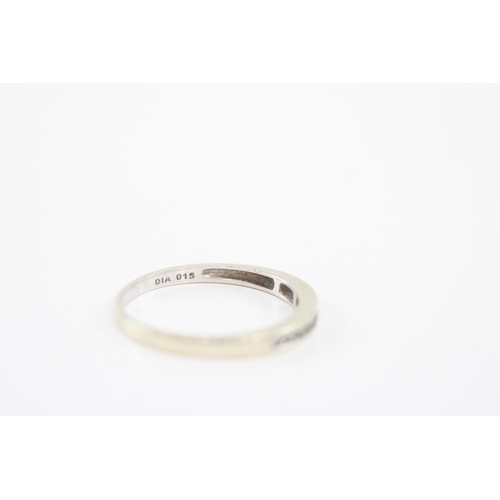 46 - 9ct white gold diamond channel set ring (1.5g) Size O