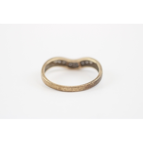 47 - 9ct gold diamond channel set wishbone ring (2.2g) Size Q