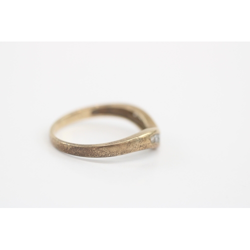 47 - 9ct gold diamond channel set wishbone ring (2.2g) Size Q