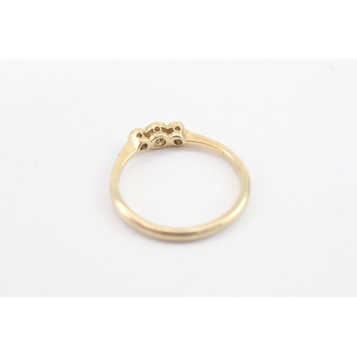 52 - 18ct gold & platinum diamond three stone ring (2.2g) Size O