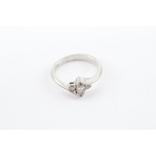 53 - 18ct white gold diamond three stone ring (2.6g) Size G
