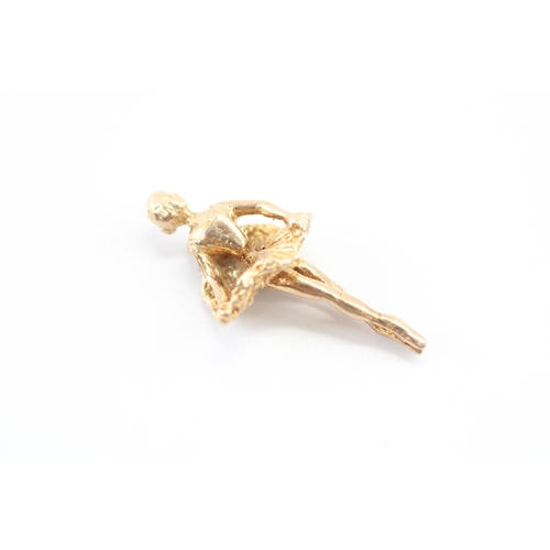 57 - 9ct gold ballerina charm, as found missing jump ring (2.3g)