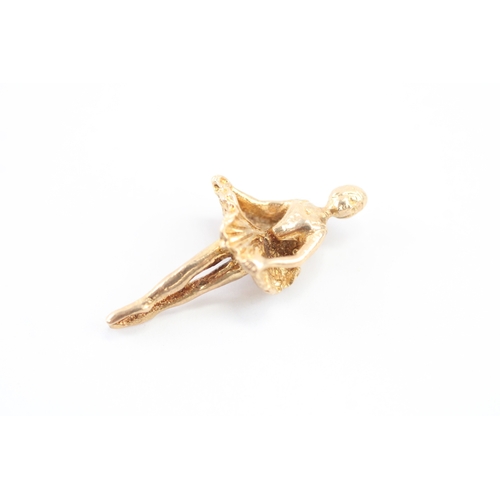 57 - 9ct gold ballerina charm, as found missing jump ring (2.3g)