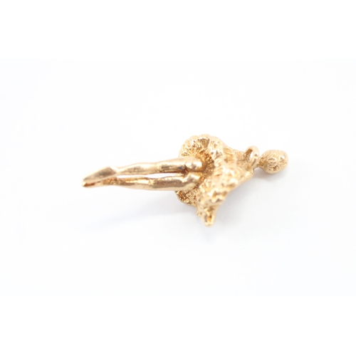 57 - 9ct gold ballerina charm, as found missing jump ring (2.3g)