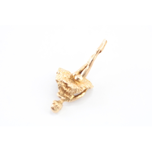 57 - 9ct gold ballerina charm, as found missing jump ring (2.3g)