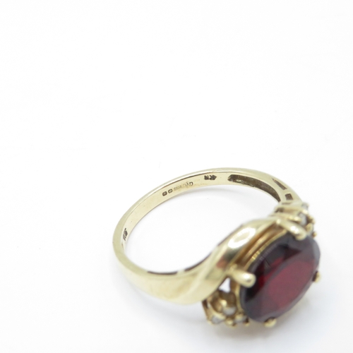 48 - 9ct gold garnet diamond dress ring (2.9g) Size N 1/2