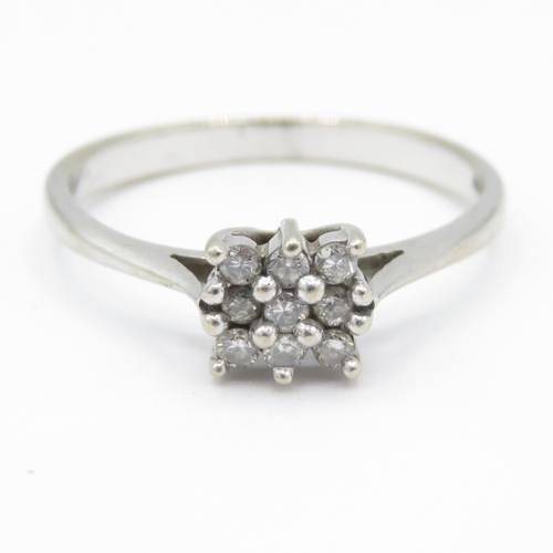 23 - 9ct white gold diamond set cluster ring (2.3g) Size R 1/2