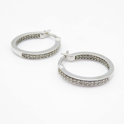57 - 9ct white gold diamond set hoop earrings (2.6g)