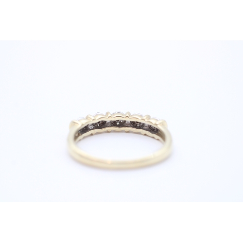 28 - 9ct gold diamond set eternity ring (2.7g) Size Q