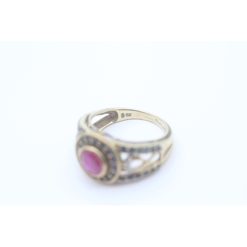 31 - 9ct gold diamond, ruby and sapphire set dress ring (3.4g) Size K