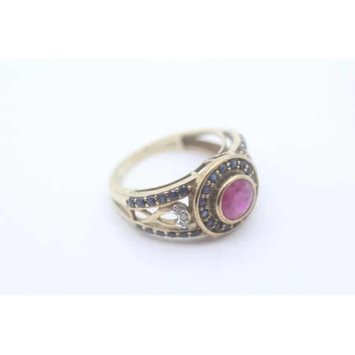 31 - 9ct gold diamond, ruby and sapphire set dress ring (3.4g) Size K