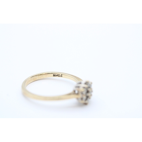 34 - 9ct gold diamond set cluster ring (2.2g) Size M