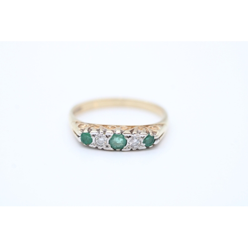 39 - 9ct gold diamond and emerald set boat ring (2.4g) Size O