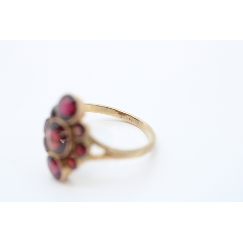 41 - 9ct gold garnet set cluster ring (1.9g) Size J 1/2