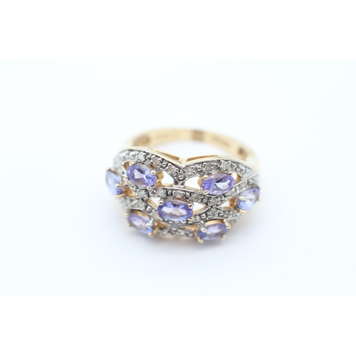 42 - 9ct gold tanzanite and diamond set dress ring (6.6g) Size Q