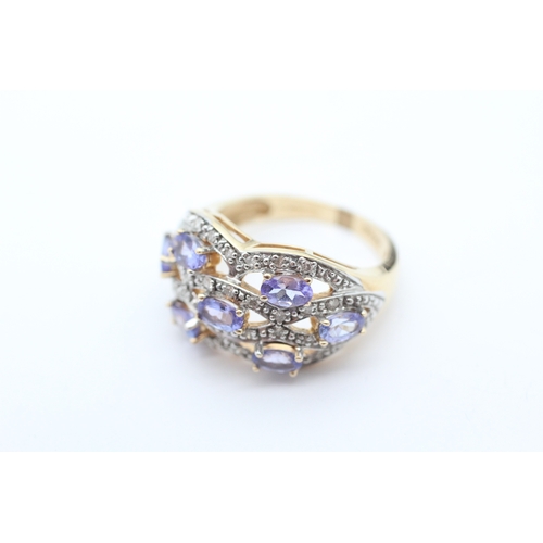 42 - 9ct gold tanzanite and diamond set dress ring (6.6g) Size Q