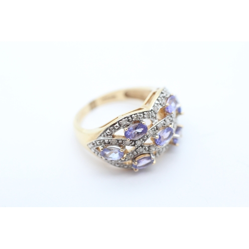 42 - 9ct gold tanzanite and diamond set dress ring (6.6g) Size Q