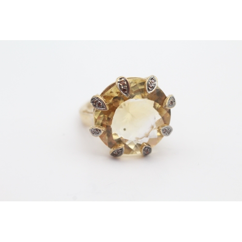 47 - 9ct gold citrine and red gems set cocktail ring (6.6g) Size J 1/2