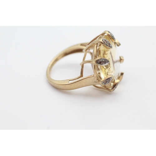 47 - 9ct gold citrine and red gems set cocktail ring (6.6g) Size J 1/2