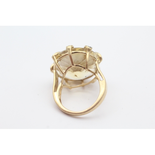 47 - 9ct gold citrine and red gems set cocktail ring (6.6g) Size J 1/2