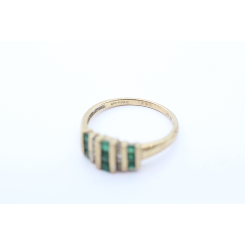 54 - 9ct gold diamond and emerald band ring (2.4g) Size R
